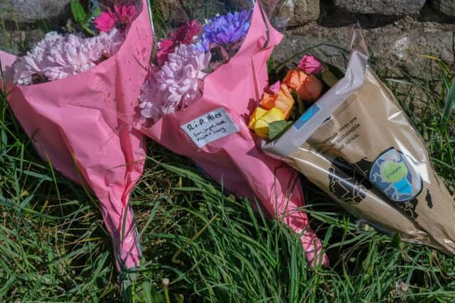 Flowers left close to the scene where Alex was found