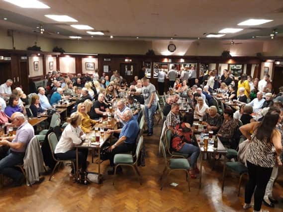 Hundreds of people went to a fund-raiser at Higher Ince Social Club for the Huntington's Disease Association