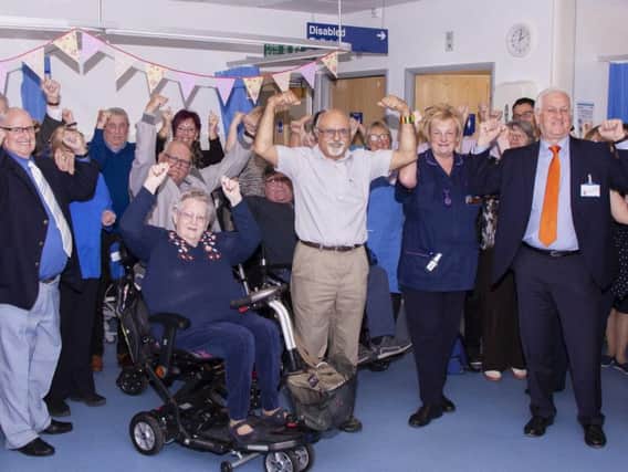The new COPD unit at Wigan Infirmary is opened by chief executive Andrew Foster, with staff and members of a support group