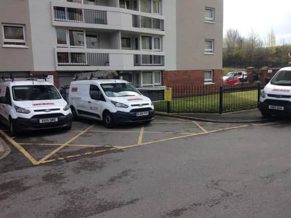 Contractors using the parking bays for their vans