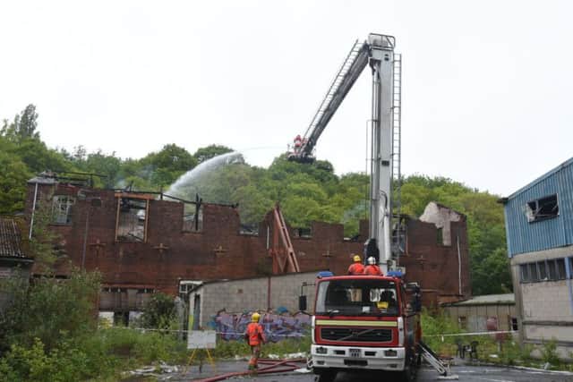 Firefighters continued to work at the site on Friday morning