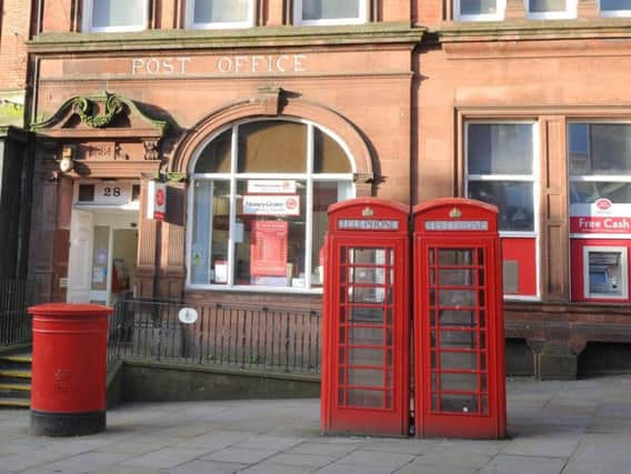 The two phone boxes outside the doomed Crown post office on Wallgate are available to buy by a local group or community organisation for 1 each