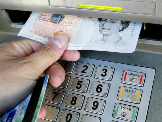 Cash machine numbers are falling in Wigan
