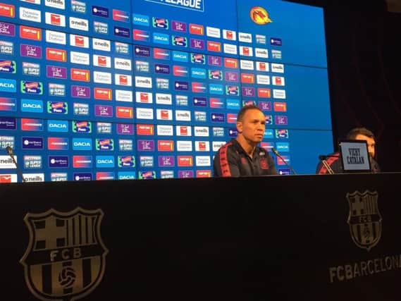 Adrian Lam speaks to the media at Camp Nou