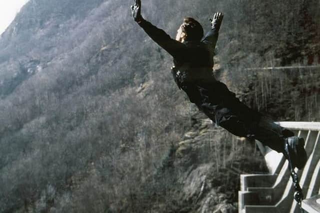 Stuntman Wayne Michaels prepares to jump off the Verzasca Dam for the GoldenEye film