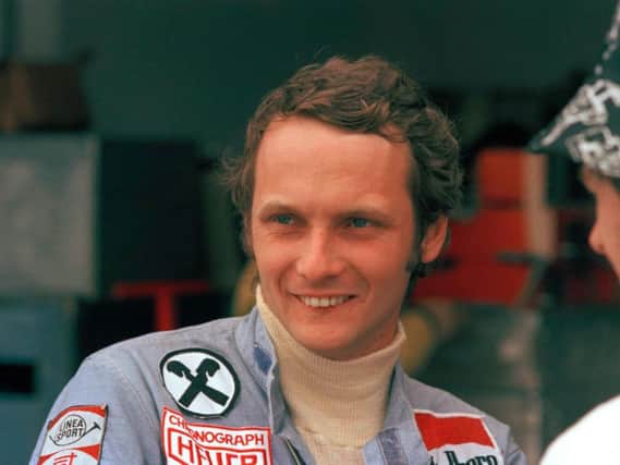 Austrian auto racer Niki Lauda, pictured in 1975 during the Argentine Grand Prix in Buenos Aires. Three-time Formula One world champion Niki Lauda has died at the age of 70. (AP Photo/E. Di Baia)