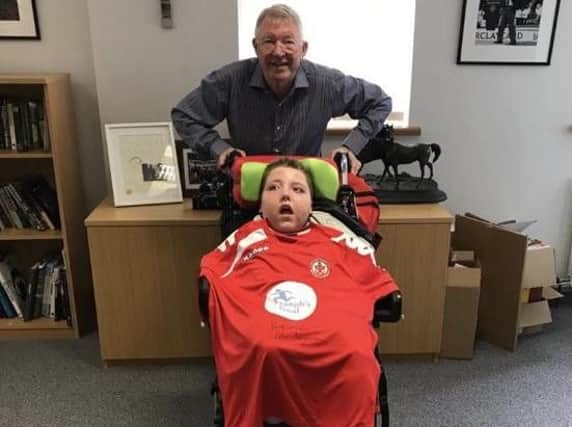 Sir Alex Ferguson with Joseph Kendrick, publicising this weekend legends game at Ashton Town FC between Latics and Manchester United