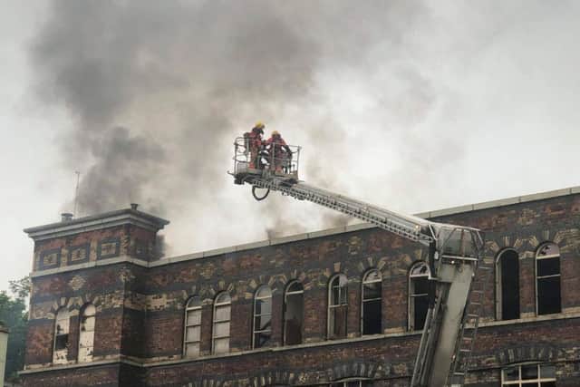 Firefighters are using aerial platforms to tackle the blaze