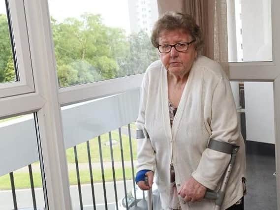 Lilian Clarkson who says she is trapped in her own home because of broken lifts ; left Derby House