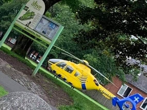 The air ambulance lands at Alexandra Park this morning. Photo submitted to Wigan Today