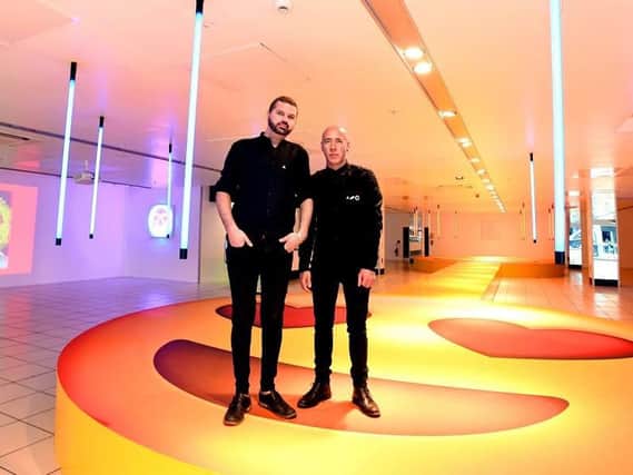 Al and Al on the emoji stage in the main headquarters of The Fire Within inside The Galleries