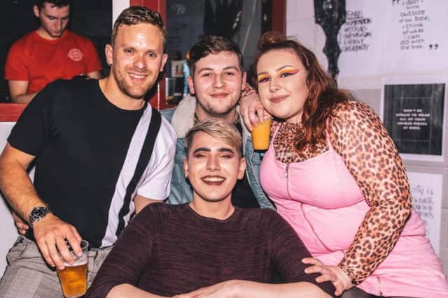 Jack Goodison (back, centre from Ashton and his friends were out on Saturday night when they were attacked by homophobic thugs