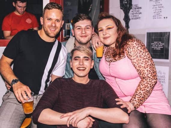 Jack Goodison (back, centre from Ashton and his friends were out on Saturday night when they were attacked by homophobic thugs