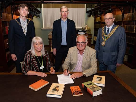 George Orwell's son Richard Blair, seated right, with, from left, mayoral consort Oliver Waite, Lesley O'Halloran, assistant director of customer services at Wigan Council, Neil Smith, treasurer of the Orwell Society, and Coun Steve Dawber, Mayor of Wigan
