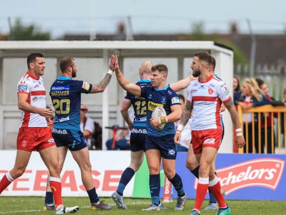 Wigan Warriors battled to a 19-18 win at Hull KR