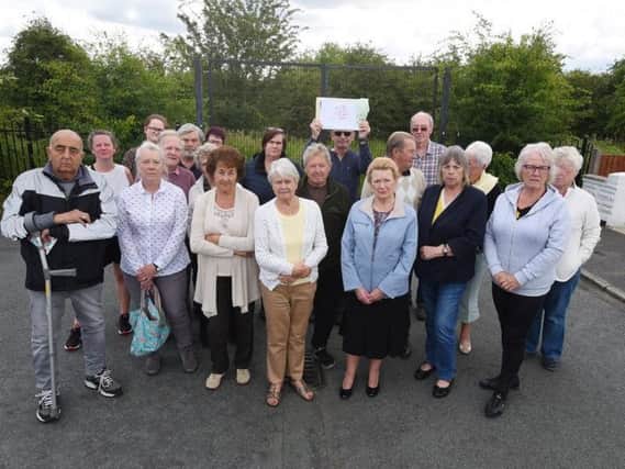 Residents protest at the site