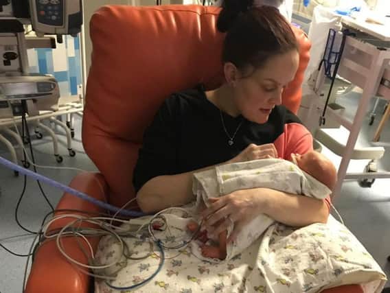 Kathryn Hughes in hospital with her son Joshua