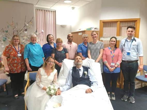 Jo and Nick Glover with Wigan Infirmary staff