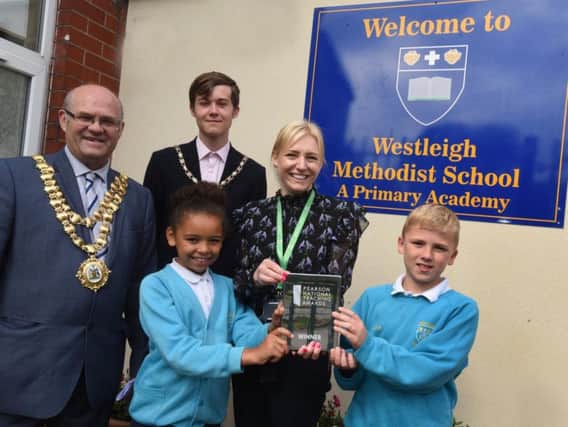 The Mayor of Wigan Coun Steve Dawber and consort Oliver Waite with head teacher Amy Burkes and pupils