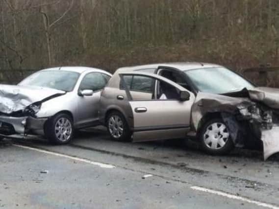 The two wrecked cars in Slag Lane. Picture courtesy of GMP