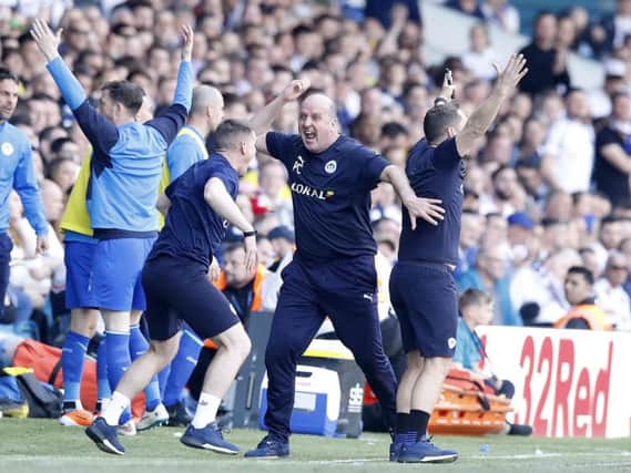 Paul Cook's Wigan Athletic start their Championship campaign against Cardiff
