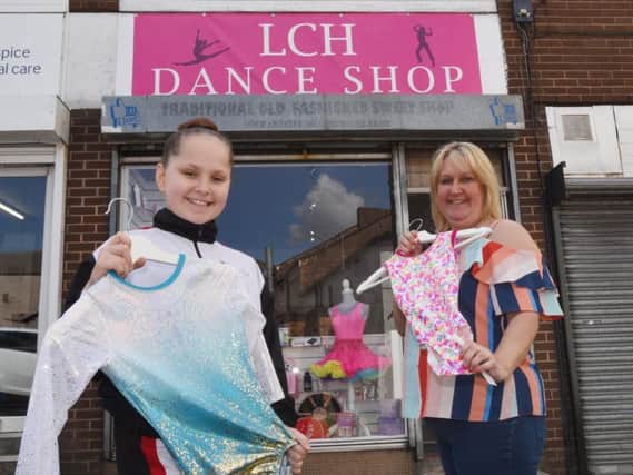 Amanda Hellman and her daughter Leonie, 11, outside the LCH Dance Shop