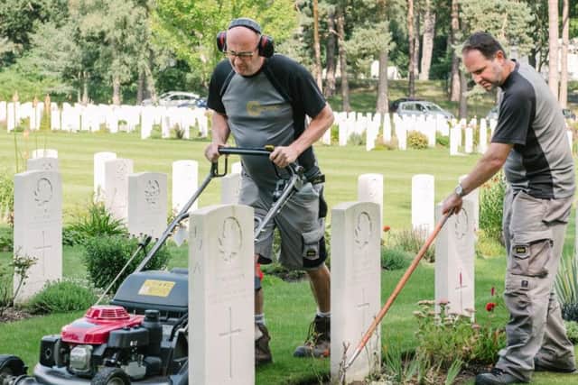 Staff maintaining one of the sites. Pic: CWGC/PA Wire
