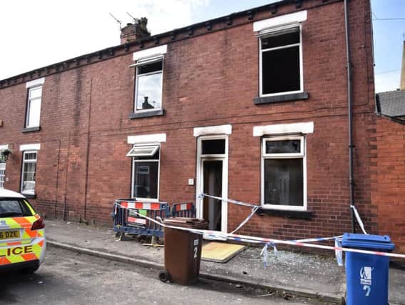 The scene of the house fire on Haworth Street in Hindley