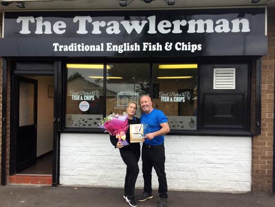 Steve Westhead and partner Vicky Booth outside their award-winning chip shop