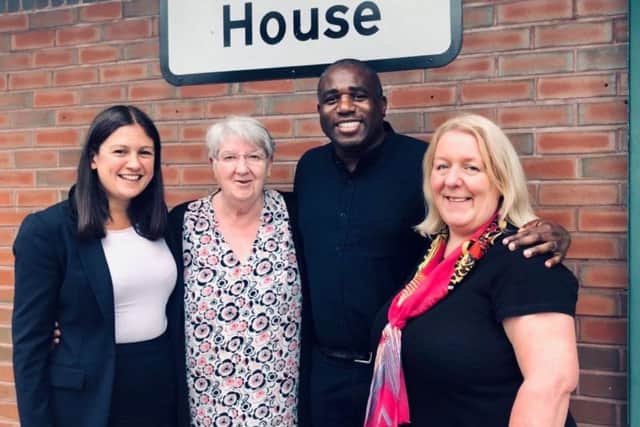 Lisa Nandy, Barbara Nettleton, David Lammy and general manager Liz Heaton at Sunshine House Community Hub in Scholes, Wigan
