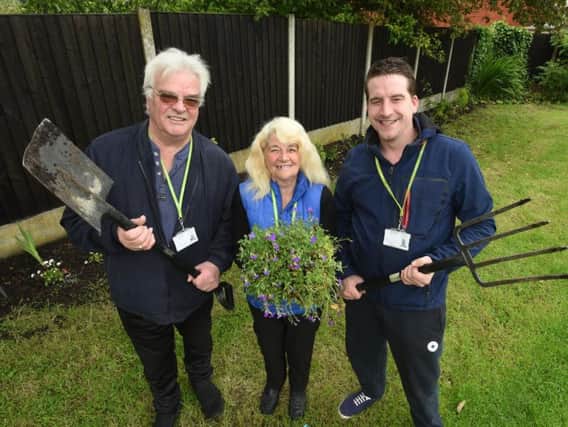The three Bryn Independent councillors on gardening duties
