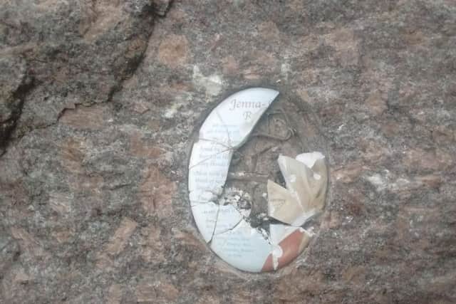 The damaged memorial stone in Wigan town centre