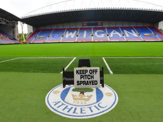 The picture-perfect playing surface at the DW Stadium, with the new big screen being put up in the background