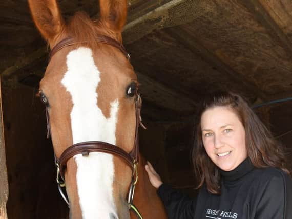 Heidi Crawford with her horse Donald, she is battling cancer and organising a charity event to raise funds for treatment and a wig room at The Christie.