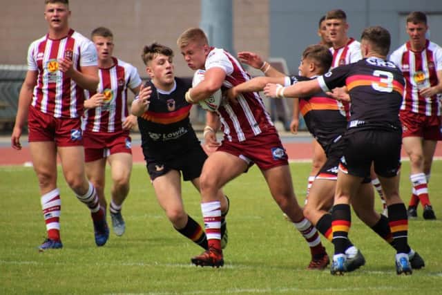 Harry Rushton on the charge. Pictures: Darren Greenhalgh