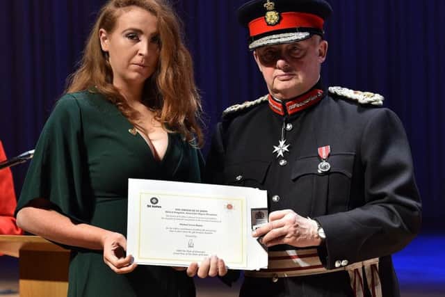 Katy Rajnis with the Lord of Lieutenant of Greater Manchester Warren Smith