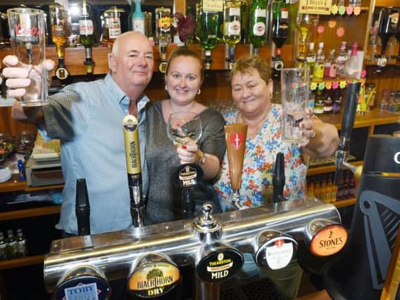 David and Marie Coleman have been in charge at St Thomas Sports and Social Club in Marsh Green for 30 years and have been helped out by their granddaughter Samantha Hardman who is pictured centre