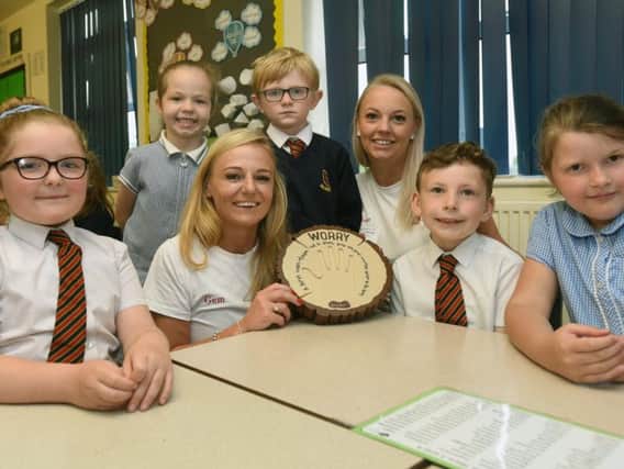 Gemma and Kate with pupils at Sacred Heart Catholic Primary School