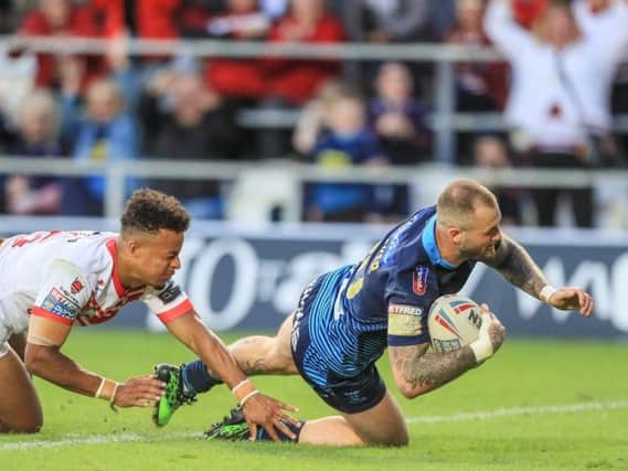 Zak Hardaker scores the try of the night but Wigan were well beaten at St Helens