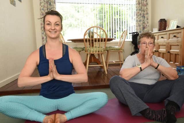 Maria Williams (right) with yoga instructor Clare Lee