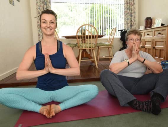 Maria Williams (right) with yoga instructor Clare Lee