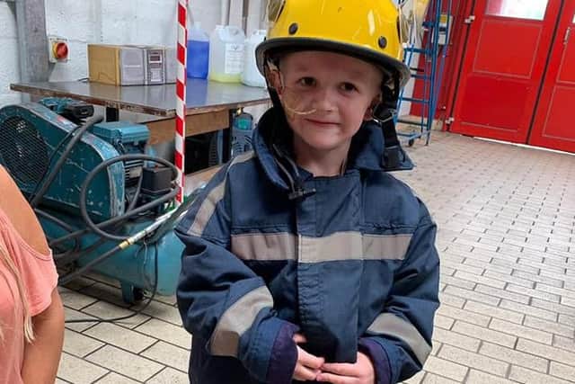 Theo Hamilton melted the hearts of the firefighting team