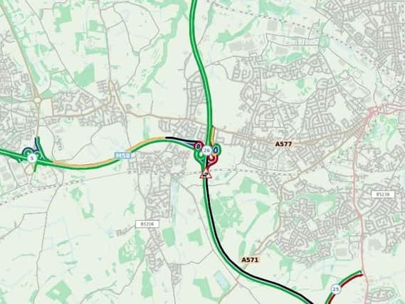 The crash is now causing tailbacks on the M58 eastbound carriageway.