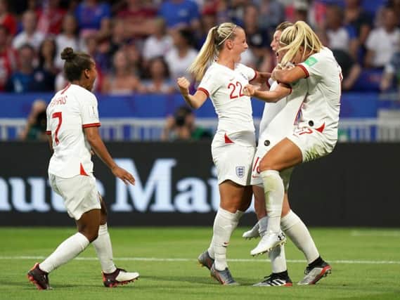 The Lionesses celebrate a goal at the FIFA Women's World Cup