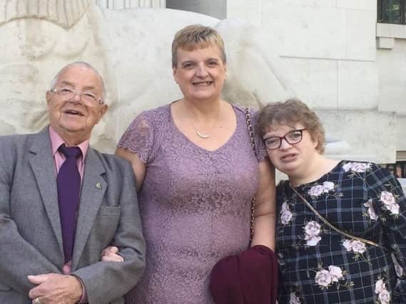 Liz Saunders with her husband Neil and daughter Toni