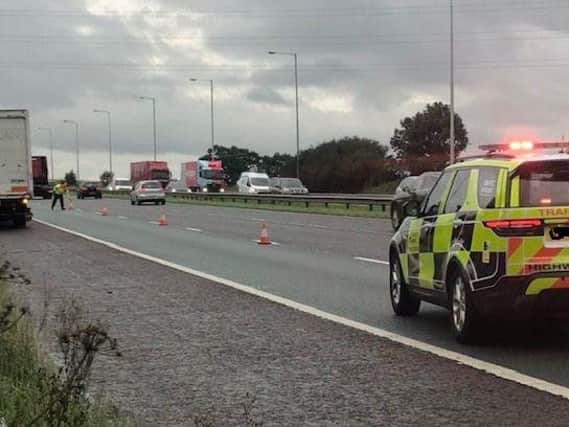 There is currently 1 lane closed on the M6 from J28 (Leyland, B5256) towards J27 (Standish, Parbold) to allow a fitter to safely change the offside tyre on a lorry.