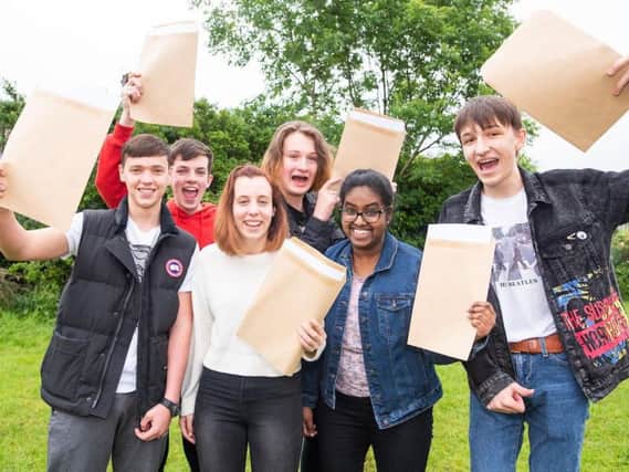 St John Fisher High School pupils celebrate their GCSE results