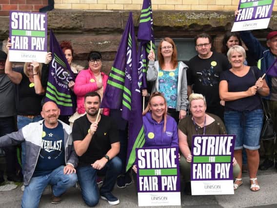 Addaction workers and Unison members on the picket line outside Coops Building