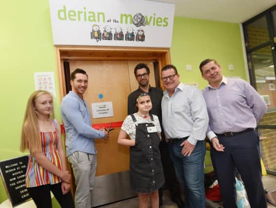 Wigan actor Ben Batt, officially opens the new family cinema facility, Derian at the Movies, at Derian House, Chorley, from left, Francesca, actor Ben Batt, Amelie, Stephen Nevison from Intuitive Homes, Ian Morrish from Together For Cinema and David Robinson CEO of Derian House