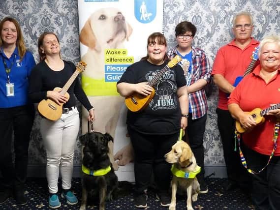 Wigan Ukulele Club raised a thousand pounds for The Guide Dogs Association